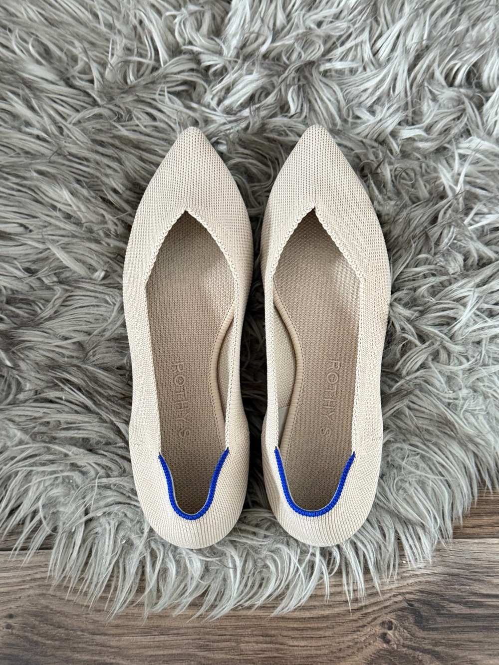 Rothy's Pointed Knit Flats in Ecru with Blue Heel Accent